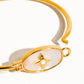 AILEEN GOLD VINTAGE STAR SHELL BANGLE