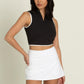 BLACK WHITE LINED HALF-ZIP CROP TOP